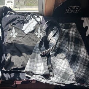 3 pack cute simple alt outfit. Shirt with cross detailing, plaid skirt and belt